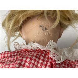 Heubach Koppelsdorf Germany bisque head doll with applied hair, sleeping eyes, open mouth with teeth and composition body with jointed limbs; marked 'Heubach Koppelsdorf 342.6/0 Germany' H34cm; Armand Marseille bisque head baby doll with moulded hair, sleeping eyes, open mouth and composition body with jointed limbs; marked 'A.M. Germany 351./8.K.; and BND London all composition doll (3)