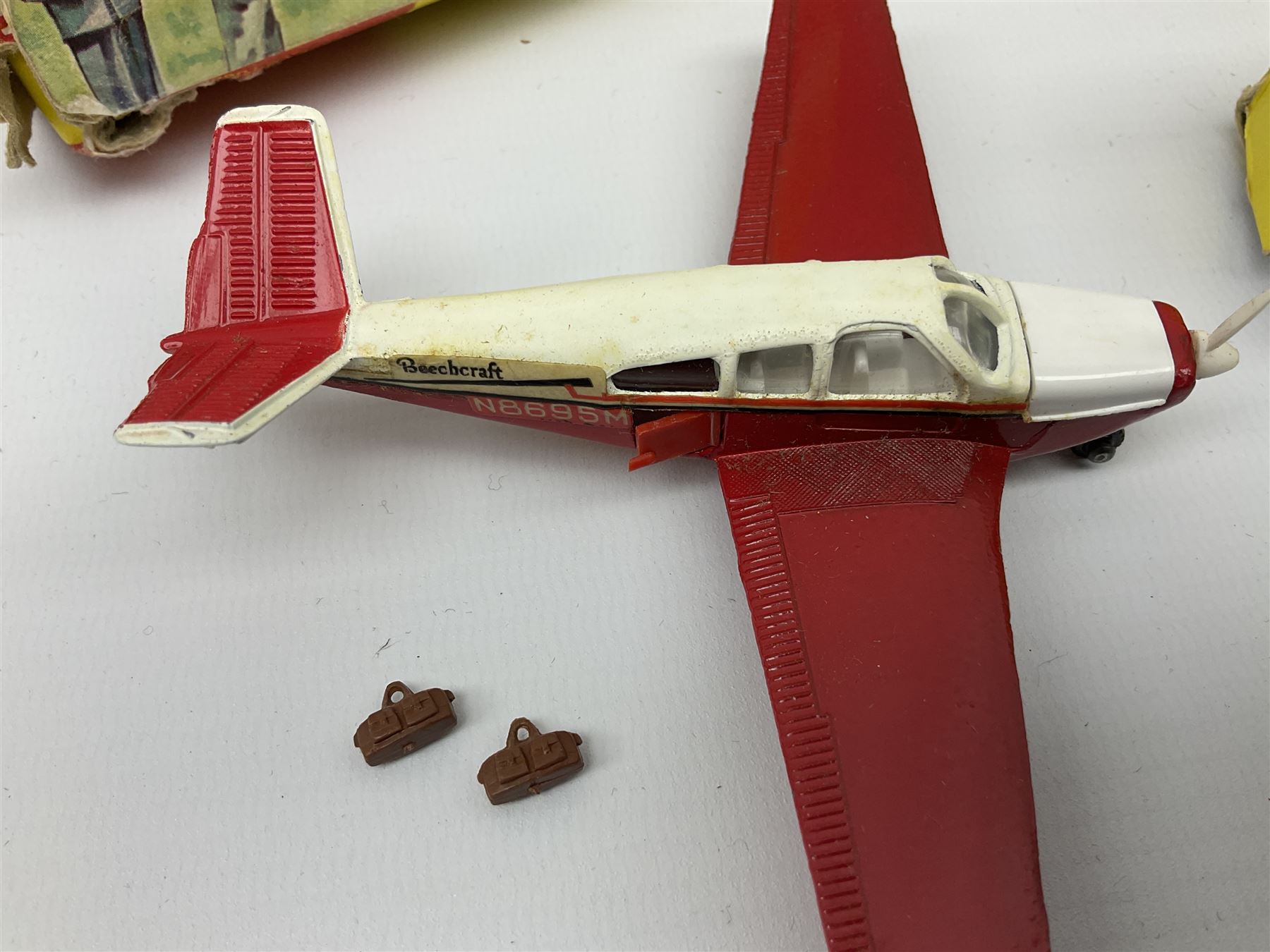 Dinky - Mercedes Benz Racing Car RN 36, No.237; Motorway Police Car No.269; Austin Mini-Moke No.342; Beechcraft S 35 Bonanza Aircraft with two pieces of luggage No.710; all boxed: and Rolls Royce Phantom V Limousine No.152; box base only with no cover (5)