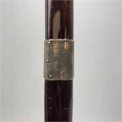 Three silver mounted walking canes, the first hallmarked Kendall & Sons Ltd, London, date letter worn and indistinct, the second hallmarked Birmingham 1924, maker's mark C&S, the third marked Sterling Silver, C&S. 