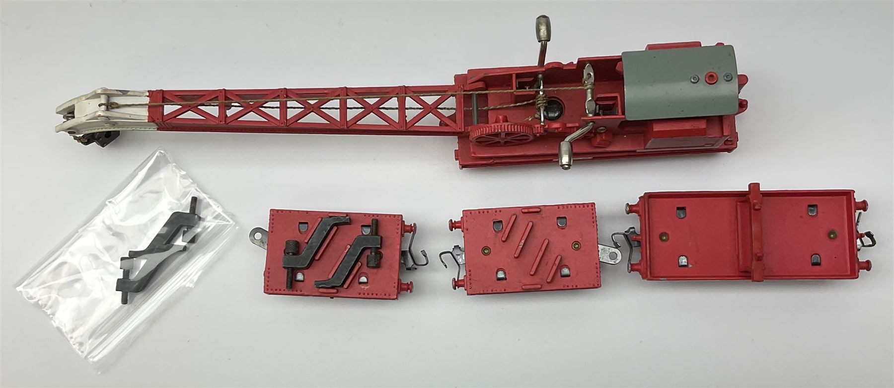 Hornby Dublo - Breakdown Crane No.4062 with screw jacks in plain red box with end label; D1 Girder Bridge, boxed; and T.P.O. Mail Van Set, boxed with mail bags (3)