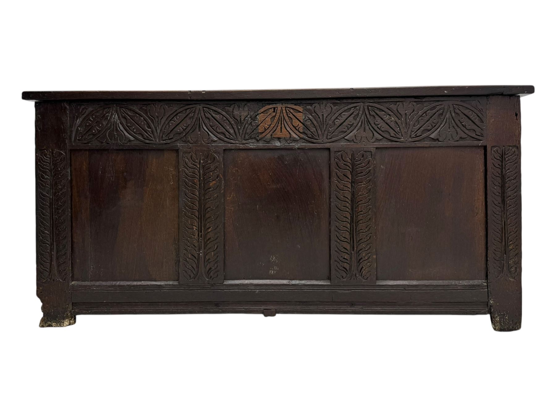 18th-century carved oak blanket chest with hand-carved floral and leaf motifs 
