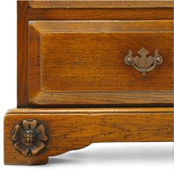 Royal Oak Furniture Company Of Grassington - Georgian design oak kneehole desk, rectangular top with moulded edge, fitted with central frieze drawer flanked by eight graduating drawers, raised on skirted base