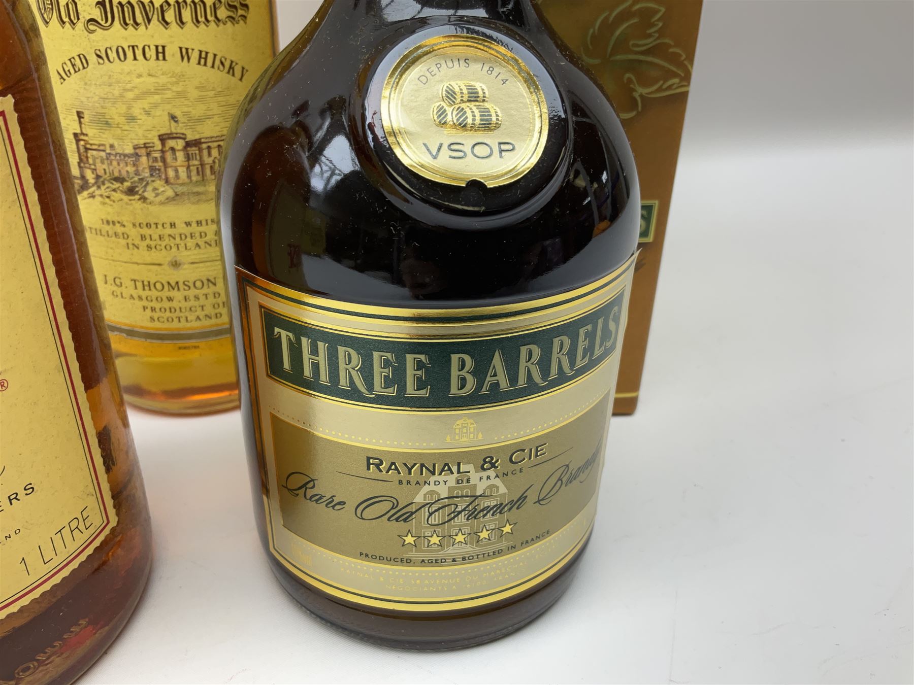 Mixed alcohol comprising Old Inverness Aged Scotch whisky, J.G.Thomson