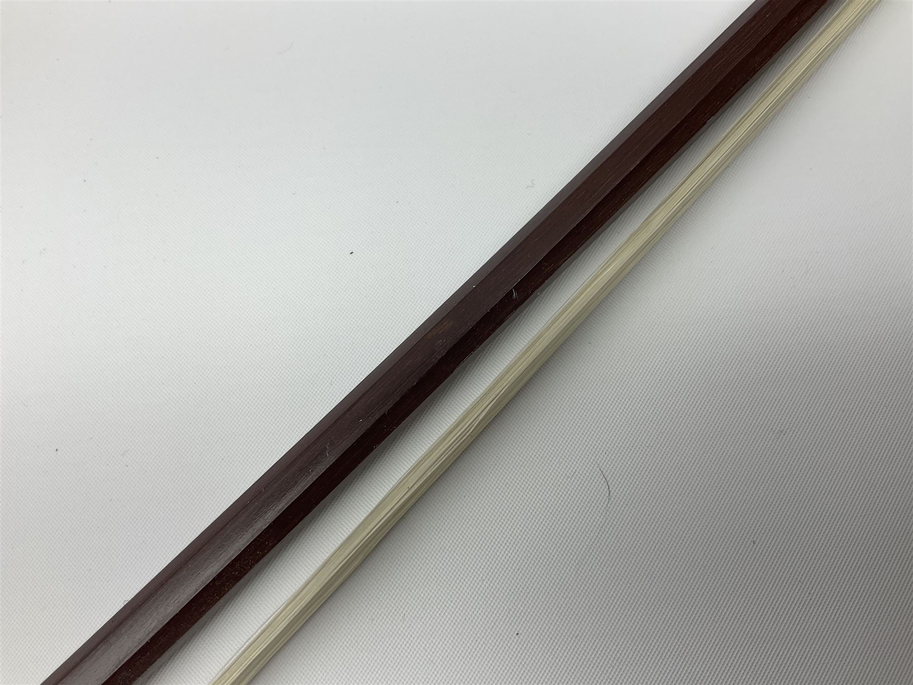 German Saxony violin c1900 with 35.5cm two-piece medium grain maple back and ribs and medium grain spruce top; bears label 'Jacobus Stainer in Absam prope Oenipontum 17xx Made in Germany', 59.5cm overall; with modern bow (2)