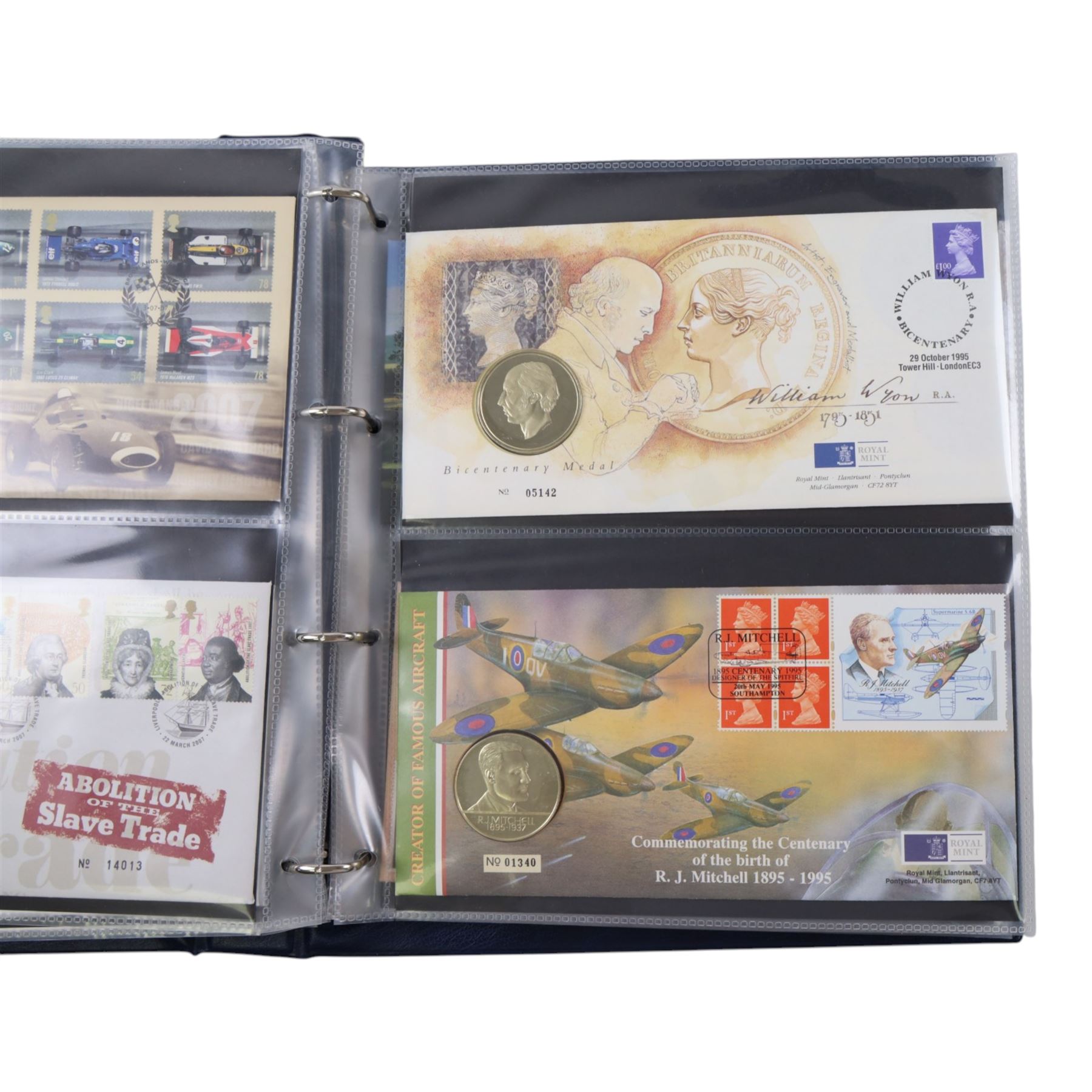 Approximately 104 Royal Mail Royal Mint coin or medallion covers, housed in an official Royal Mail Royal Mint ring binder folder and loose, together with The Queen's Golden Jubilee Coin Cover Collection in two albums, commemorative fifty pences, crowns, etc