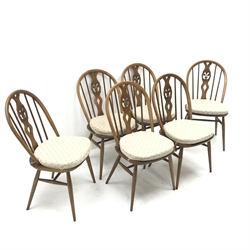 Ercol elm Old Colonial extending pedestal dining table with single leaf (W115cm and 165cm, H73cm, D115cm) and set six hoop back dining chairs (W43cm) 