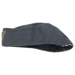 Four German style badges, including Iron Cross, German Proficiency SS runes badge, etc together with a reproduction German cap 