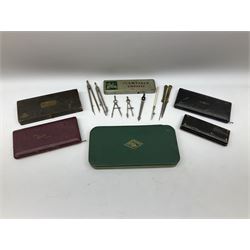 Negretti & Zambra drawing instrument set, the ruler with manuscript name 'F/Sgt. F. Hamilton R.A.F. 194(?)', cased; four other drawing instrument sets by Anker-Precision Germany, EcoBra, Temple etc, all cased; and quantity of loose drawing instruments