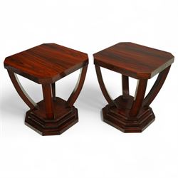 Art Deco style pair of simulated rosewood occasional tables, the angular tops with rounded...