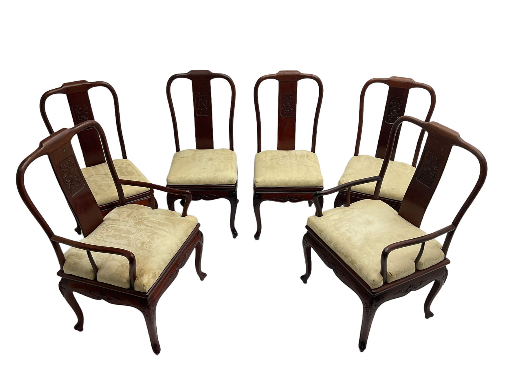 Mid to late 20th century Chinese hardwood extending dining table, two additional leaves, shaped apron carved with foliate scrolls, leaf carved cabriole supports (W246cm, H78cm, D117cm), and set six (4+2) dining chairs with shaped cresting rails over carved splats