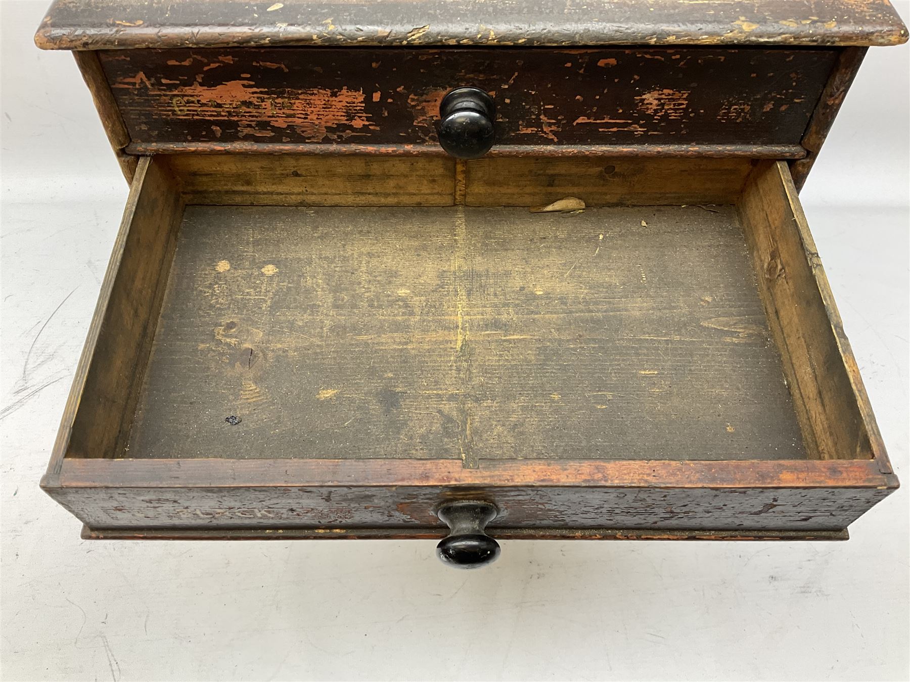 Early 20th Century Dewhurst table top chest, decorated with gilded 'Dewhurst's Sylko Machine Twist Strong Lustrous' lettering above six long drawers with names and numbers of cotton also detailed in gilt, H39cm