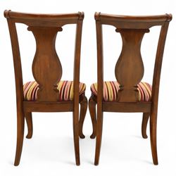 Willis & Gambier - mahogany extending dining table, rectangular top with rounded corners on cabriole legs, with two 35cm extension leaves, four Willis & Gambier upholstered high back chairs and four mahogany chairs, upholstered in a stripped multi-coloured velvet fabric, with scroll-shaped top rail, lyre-shaped back splat on cabriole legs, chairs W46xD91x97cm (11) 