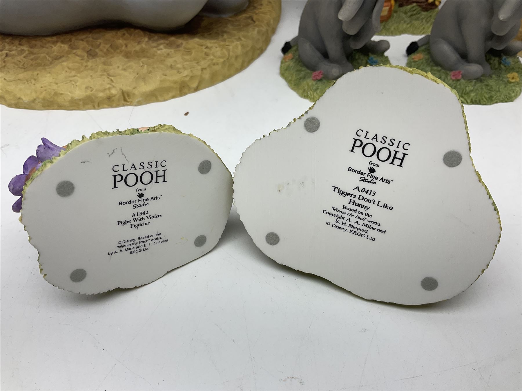 Border Fine Arts Winnie the Pooh figures, to include Large Pooh with Honey Pots, Large Eeyore, Pooh Party Wall Plaque and five figures from the Classic Pooh series, large pooh H42cm 
