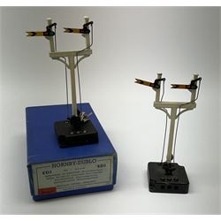 Hornby Dublo - fifteen electric semaphore signals comprising three ED1 Single Arm; two ED2 Double Arm; one ED3 Junction Signal Upper Quadrant; two ES6 Colour Light Signal - Single (Home); and three Colour Light Signal - Junction (Home); all boxed; together with four unboxed electric signals (15)