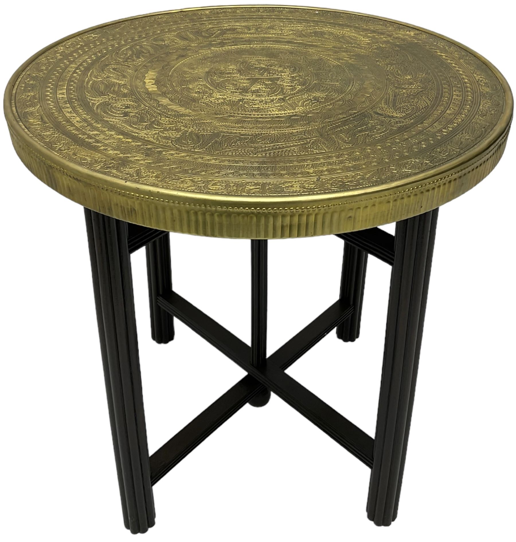 Indian brass topped folding benares table, circular top embossed with foliate and scrolling decoration, reeded supports