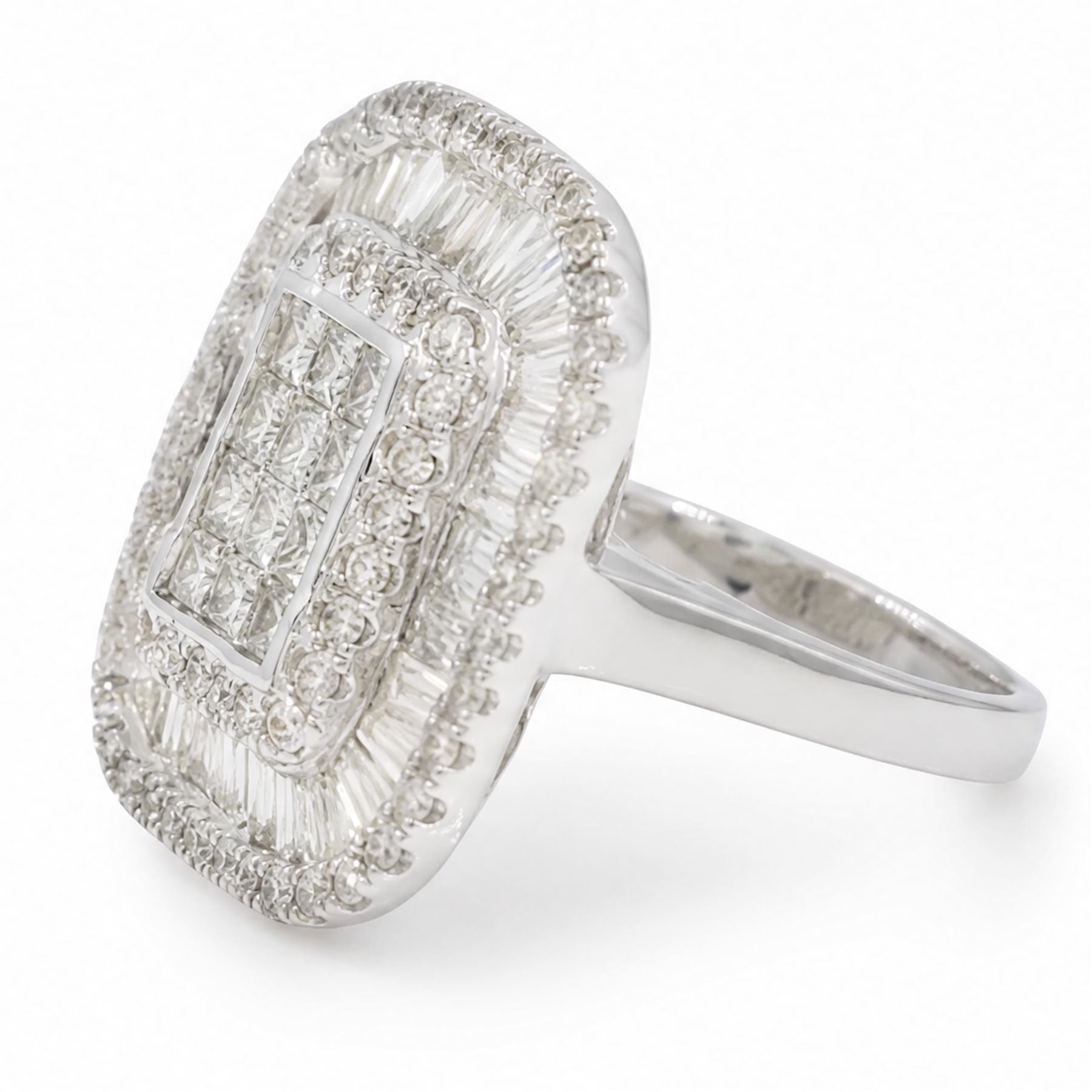 White gold diamond cluster ring, pave set with princess cut, baguette cut and round brilliant cut diamonds, hallmarked 9ct, total diamond weight 3.40 carat