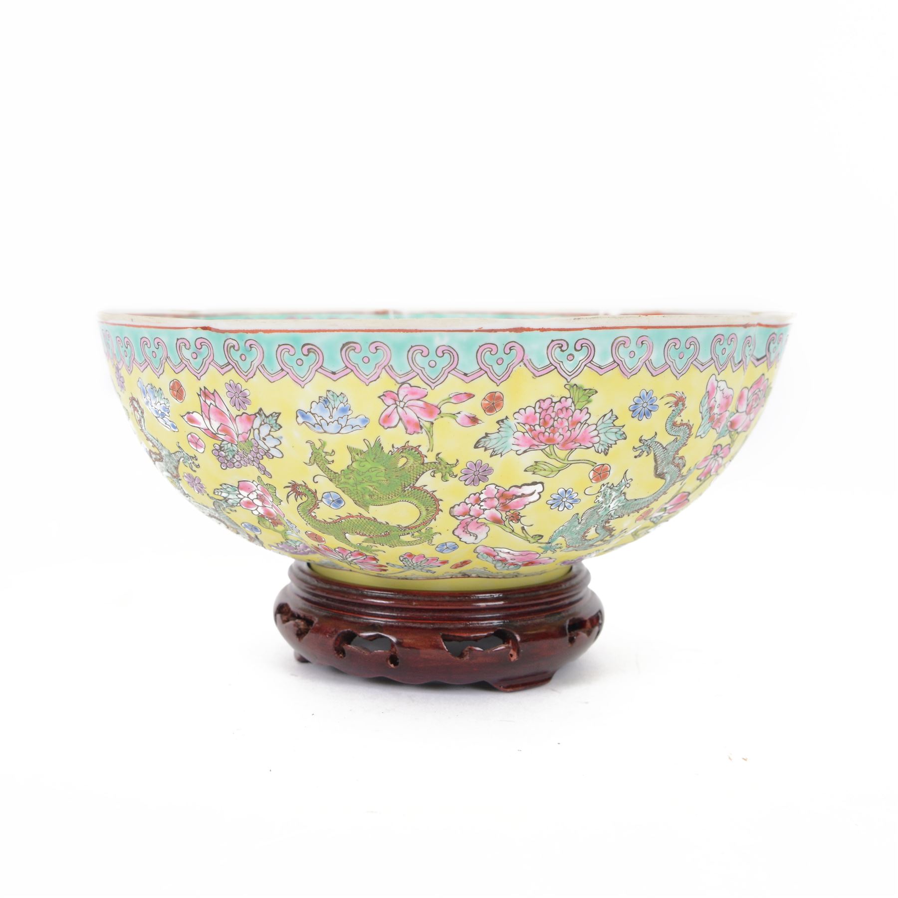 Chinese famille jaune eggshell porcelain bowl, decorated with dragons and foliage, upon hardwood stand, D26cm