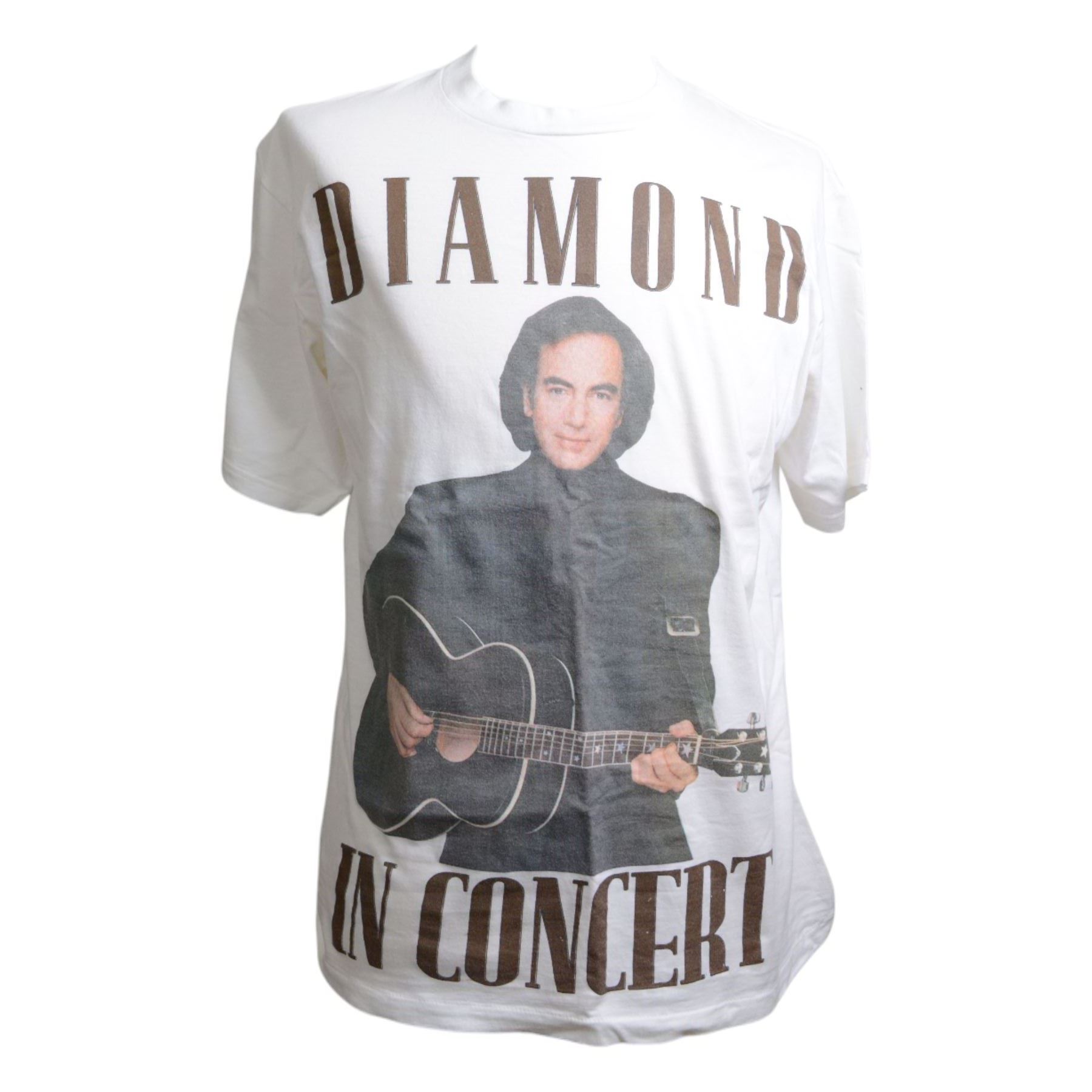 Neil Diamond tour memorabilia, including five t-shirts, cap, programmes, calendar and biography, together with a Neil Diamond In Concert poster, framed