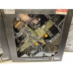 Nineteen Atlas Editions die-cast models of aircraft; to include Douglas Dakota C-47, Forke Wulf, Handley Page Halifax, De Havilland DH-98 Mosquito Mk.IV, etc and two others similar by IXO Models; all boxed (21)

