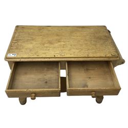 Victorian pine washstand, moulded rectangular top with rounded corners, fitted with two drawers, shaped end supports on sledge platform united by shaped stretcher, on turned bun feet