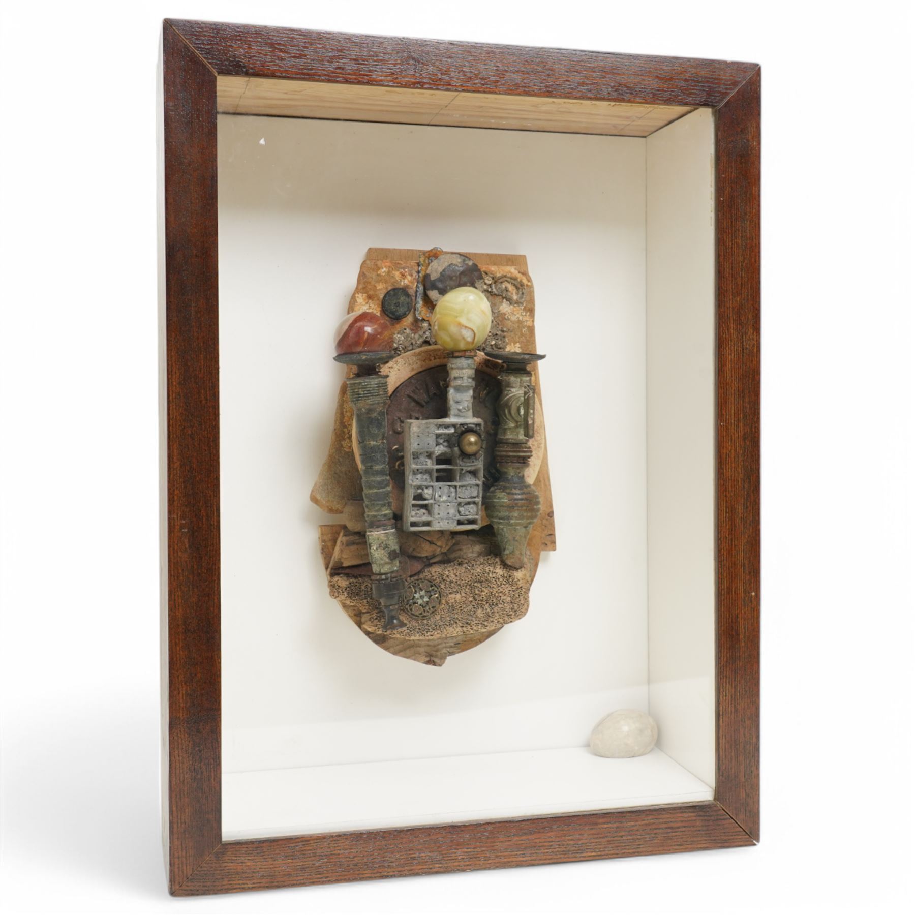 Andrew Coates (British 1939-): 'The Guardians', assemblage in wood, found objects and with three marble eggs, titled and dated 1999 verso, in case, overall 50cm x 37cm