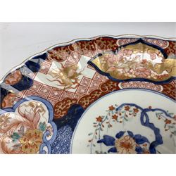 Early 20th century Japanese Imari pattern oval charger with scalloped rim, together with a Japanese Imari pattern vase decorated with dragons and hoho birds, vase H38, charge L42cm