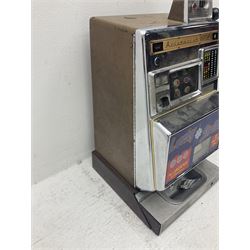 Aristocrat Nevada Lucky Strike one-armed bandit arcade machine, circa 1964, light-up display in aluminium and stainless steel case, with keys, H72cm 