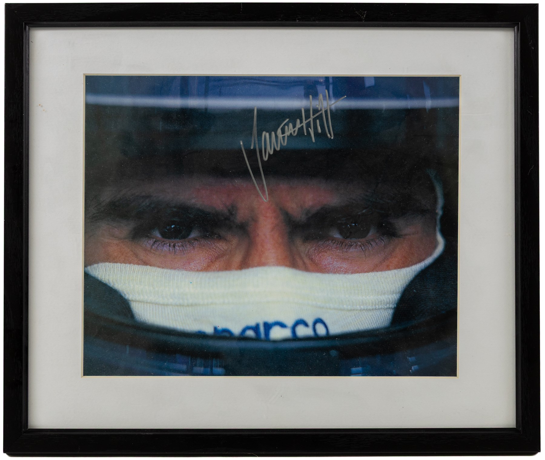 Ten signed Formula 1 photographs, comprising eight Damon Hill examples, Jenson Button and a Nigel Mansell example, nine with certificates of authenticity from Write Stuff Autographs, all framed, largest H47cm, W67cm