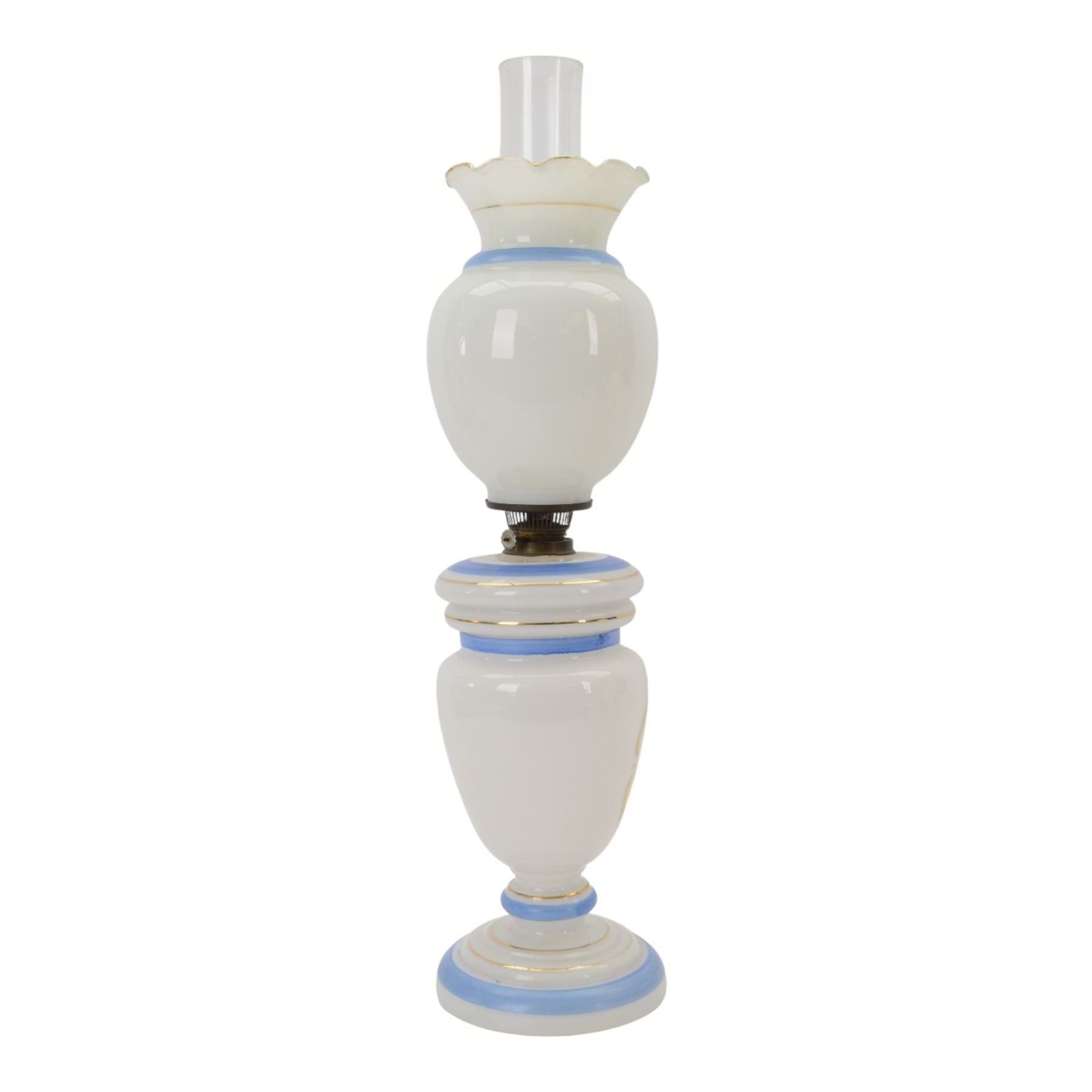 Victorian opaline glass oil lamp, with transfer printed decoration of Napoleon Bonaparte and his wife Josephine, H60cm