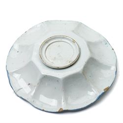 Early 18th century Frankfurt tin glazed earthenware shallow dish decorated in blue with panels of Chinese figures and landscapes D34cm