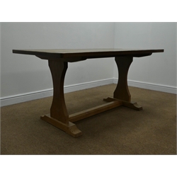  'Eagleman' rectangular oak refectory table, adzed top with solid end supports, single floor stretcher, shaped sledge feet (84cm x 153cm, H74cm) and set six oak dining chairs, solid splat with carved rose, upholstered seats, by former Mouseman apprentice Albert Jeffray of Sessay, Thirsk,  