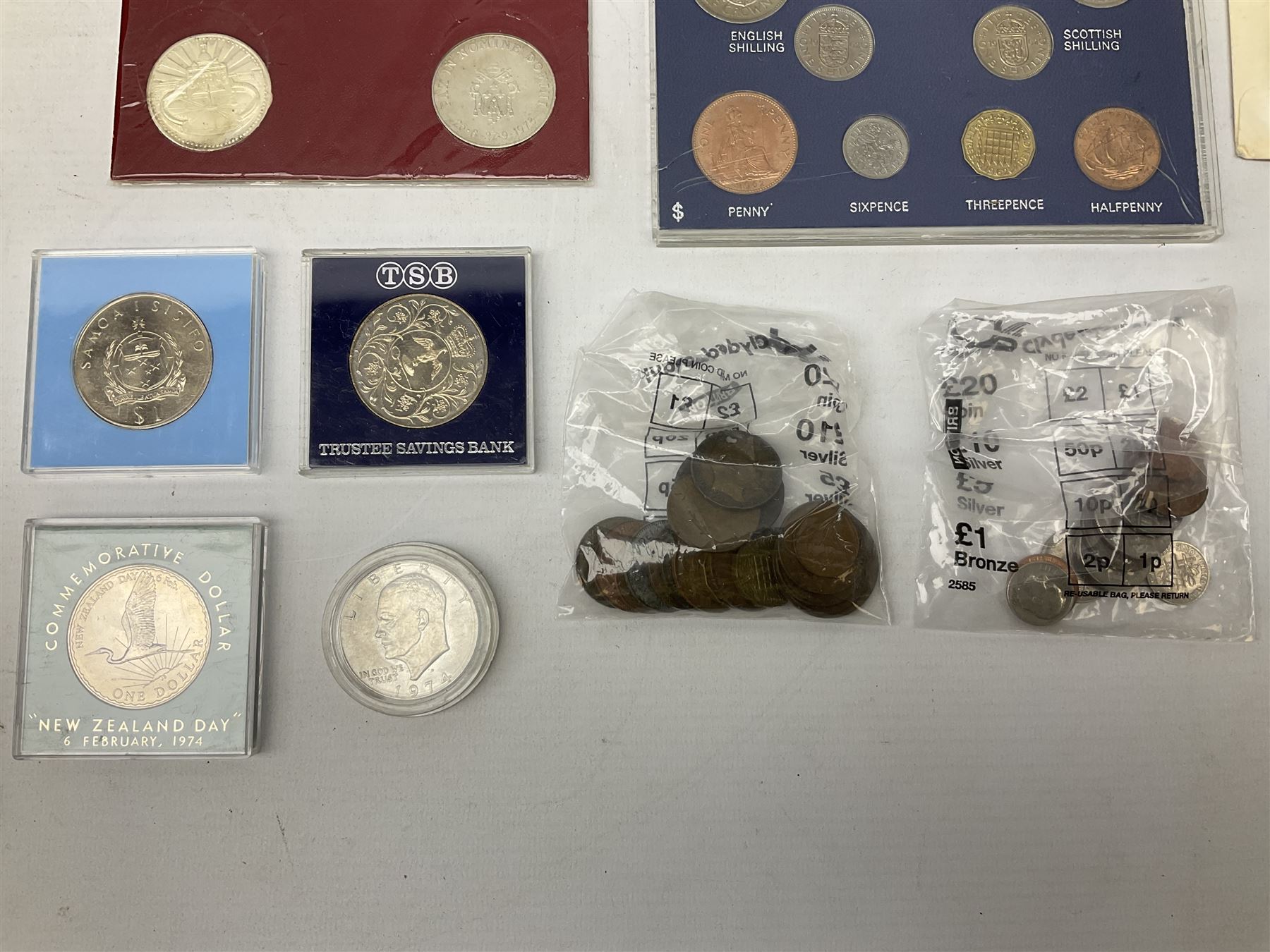 Great British and World coins, including Canadian 1975 dollar, United States of America 1975 proof set and bicentennial silver uncirculated set 1776-1976, Queen Elizabeth II Gibraltar 1977 sterling silver proof twenty-five pence, cased with certificate, New Zealand 1979seven coin set in blue wallet,  GB pre-decimal coins etc