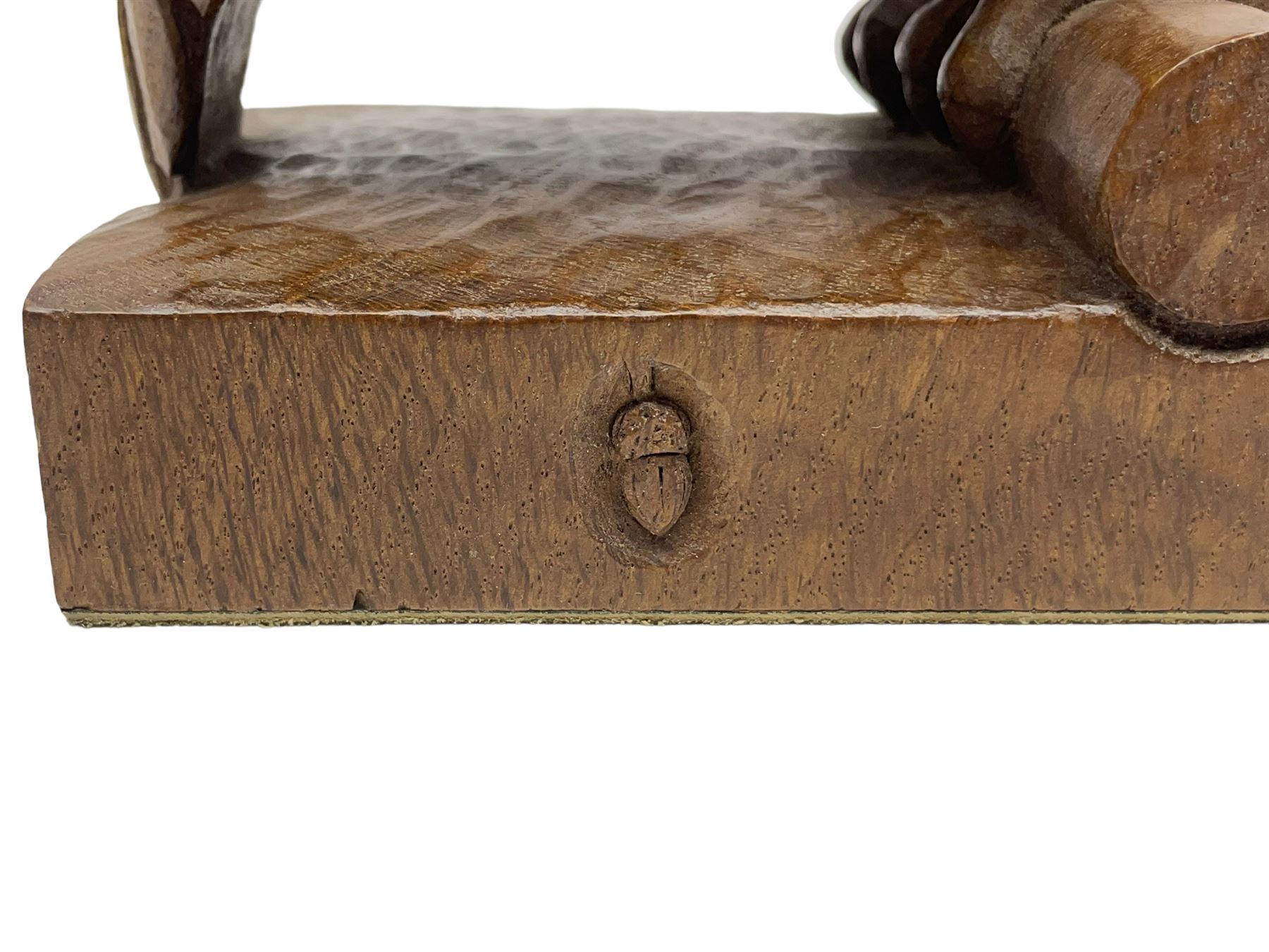 Acornman - carved oak owl perched on branch, on tooled block plinth carved with acorn signature, by the workshop of Alan Grainger, Brandsby (carved by Norman Darnley)