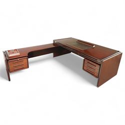 Dyrlund - contemporary Santos rosewood executive desk set, main desk with a rectangular top and leather writing pad above, floating drawer unit with right-angled desk unit top with document tray above a filing drawer 

Note: Dyrlund is a Danish furniture manufacturer known for its high-quality, handcrafted pieces, particularly in the mid-century modern style. Founded in 1960 by Frits Hjerte Dyrlund in Rude, Denmark, the company has remained a family business, now run by the second and third generations. Dyrlund specializes in both home and executive office furniture, focusing on practicality, solid construction, and classic design