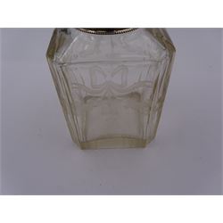 Early 20th century French silver mounted glass scent bottle, the faceted rectangular glass body etched with swags of flowers united by ribbons, with cylindrical silver cover embossed with foliate detail and beaded decoration with gilt interior, marked with Minerva's head, with white metal collar and glass stopper, H17cm