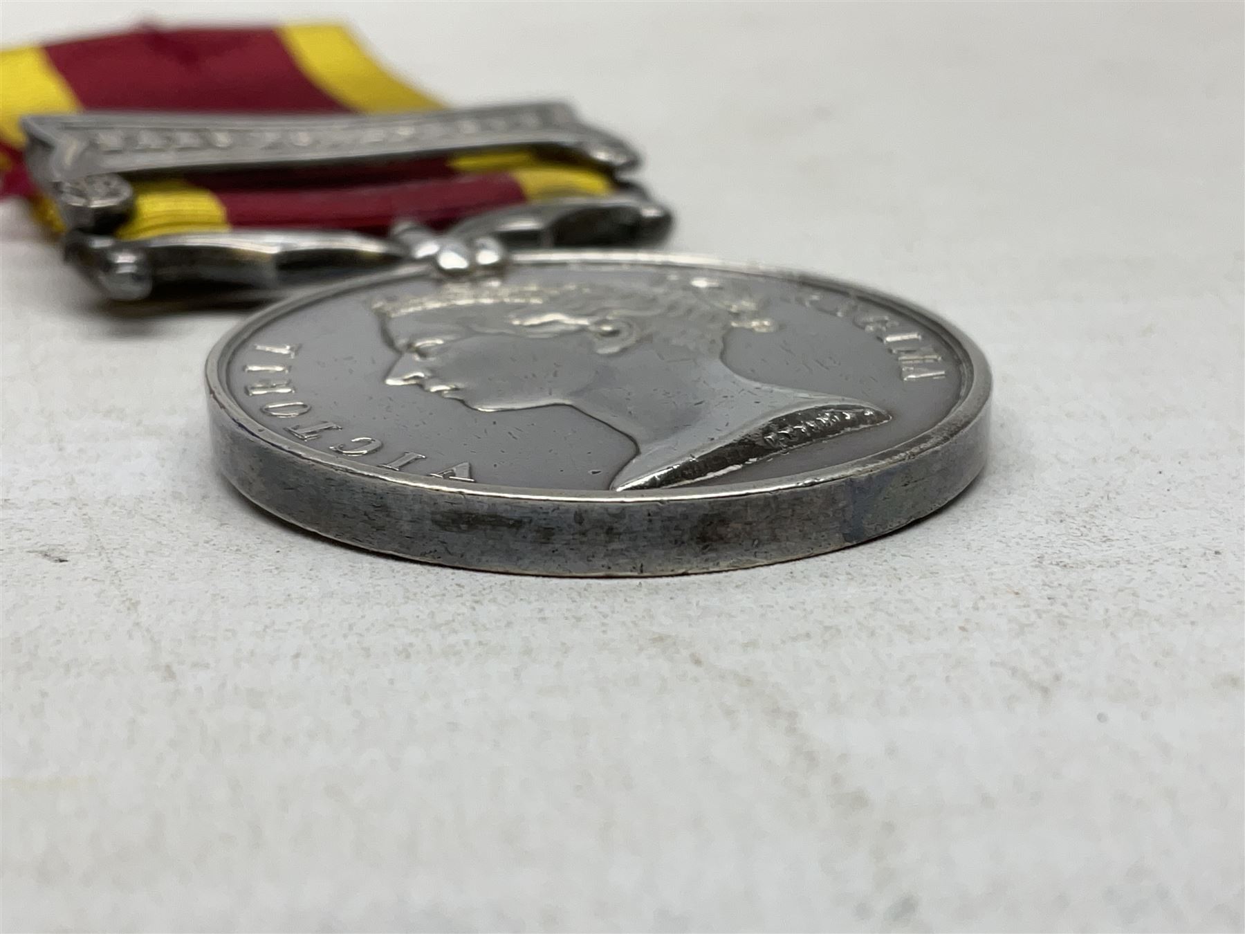 Victoria Second China War Medal, unnamed, with Taku Forts 1860 clasp and ribbon