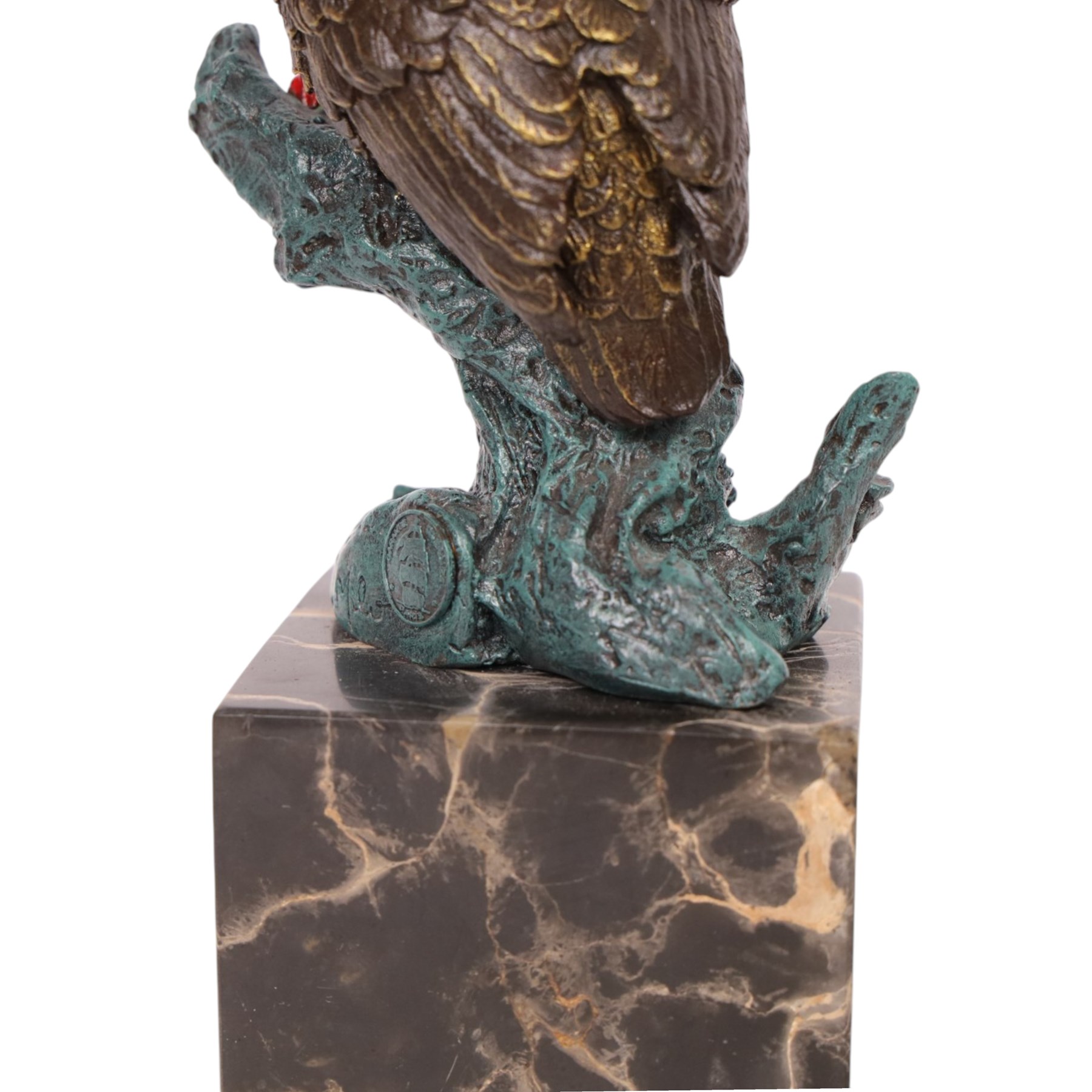 Cold painted bronze figure, modelled as an owl perched upon a tree stump signed Milo and with foundry mark, raised upon black veined marble plinth, H28cm