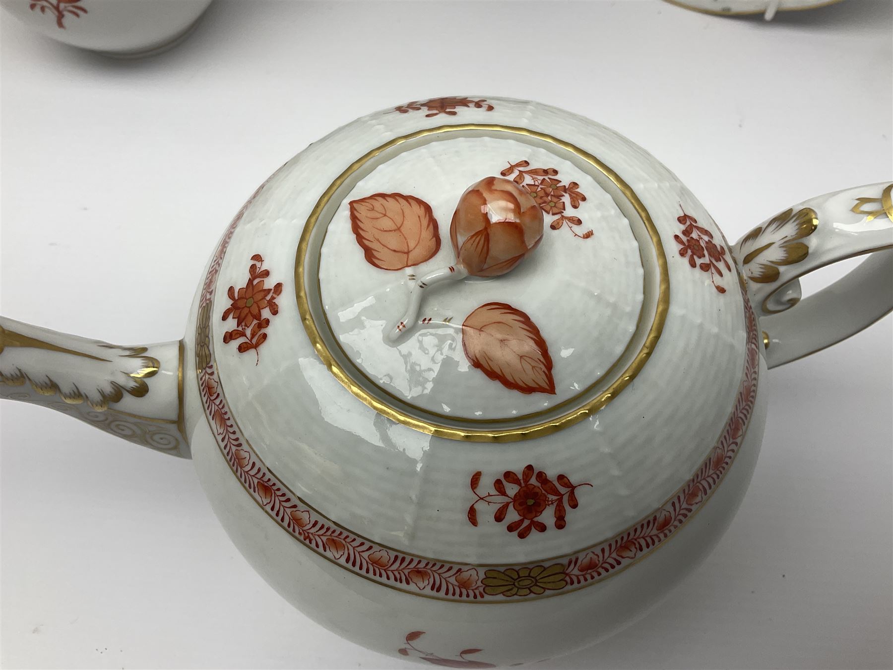 Herend Chinese Bouquet Rose pattern tea service comprising teapot, coffee pot, open sucrier, six cups and saucers, six tea plates, cream jug and stand, milk jug, two teabag holders, preserve pot, two leaf shaped dishes, four egg cups, salt & pepper pots, pair side plates and another plate