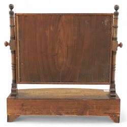 19th century mahogany swing mirror, rectangular frame on turned supports with ball finials, bow front base fitted with three drawers and ebony knob handles, raised on shaped feet