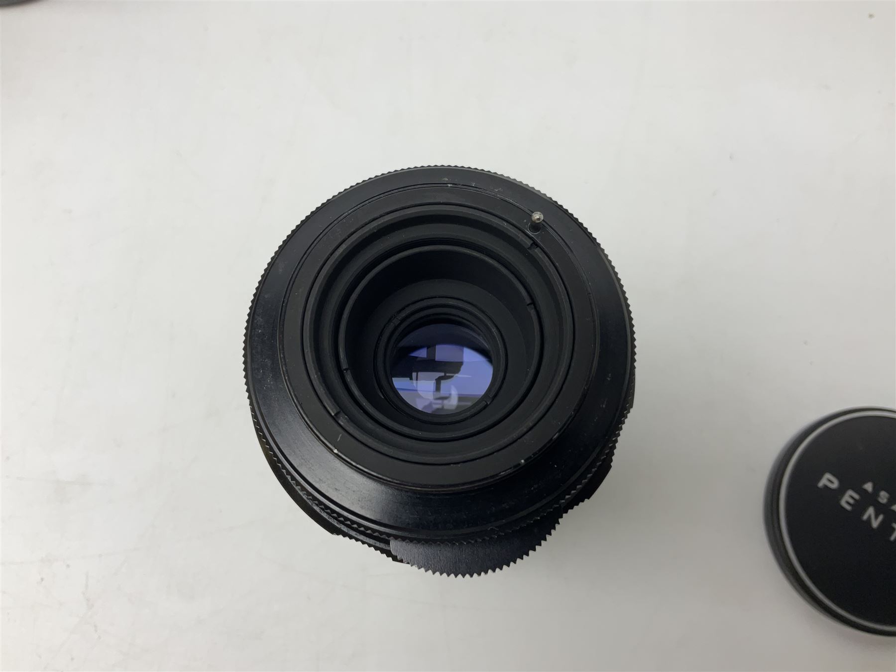 Asahi Pentax S1a camera body, serial no. 707071, with 'Super-Takumar 1:1.8/55' lens, serial no 2124044, together with Asahi Pentax Sv camera body, no. 1925617 with 'Super-Takumar 1:2/55' lens, serial no. 2770153, Asahi Pentax Meter, 'Super-Takumar 1:3.5/28' lens, serial no. 2075492 and 'Super-Takumar 1:4/150' lens, serial no. 1461613  