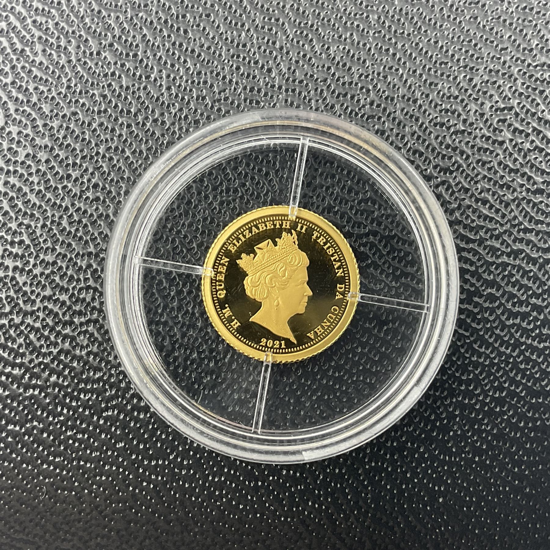 Eleven Queen Elizabeth II miniature gold coins, each being 0.5 grams of 24 carat gold, including Tristan da Cunha 2020 'Laurel', Solomon Islands 2020 '80th Anniversary of the Battle of Britain' etc, all with certificates