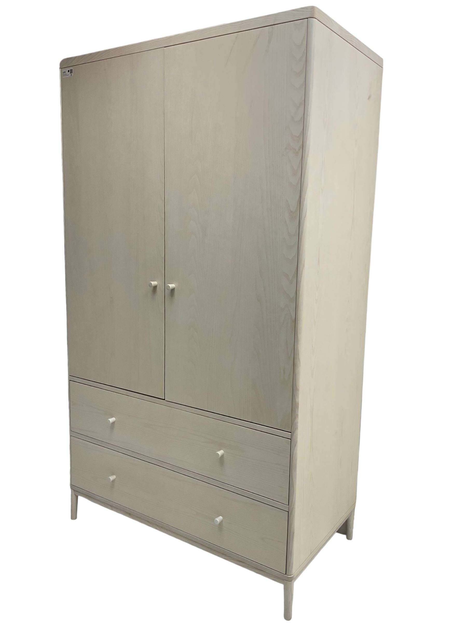 Ercol - 'Salina' wardrobe enclosed by two doors, fitted with two long drawers