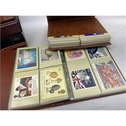 Stamps and related items, to include PHQ cards in various albums, Queen Elizabeth II usable mint mostly loose in stock books, King George VI Leeward Island one pound mint stamp etc
Great Britain and world stamps, including including mostly and Royal Mail PHQ cards