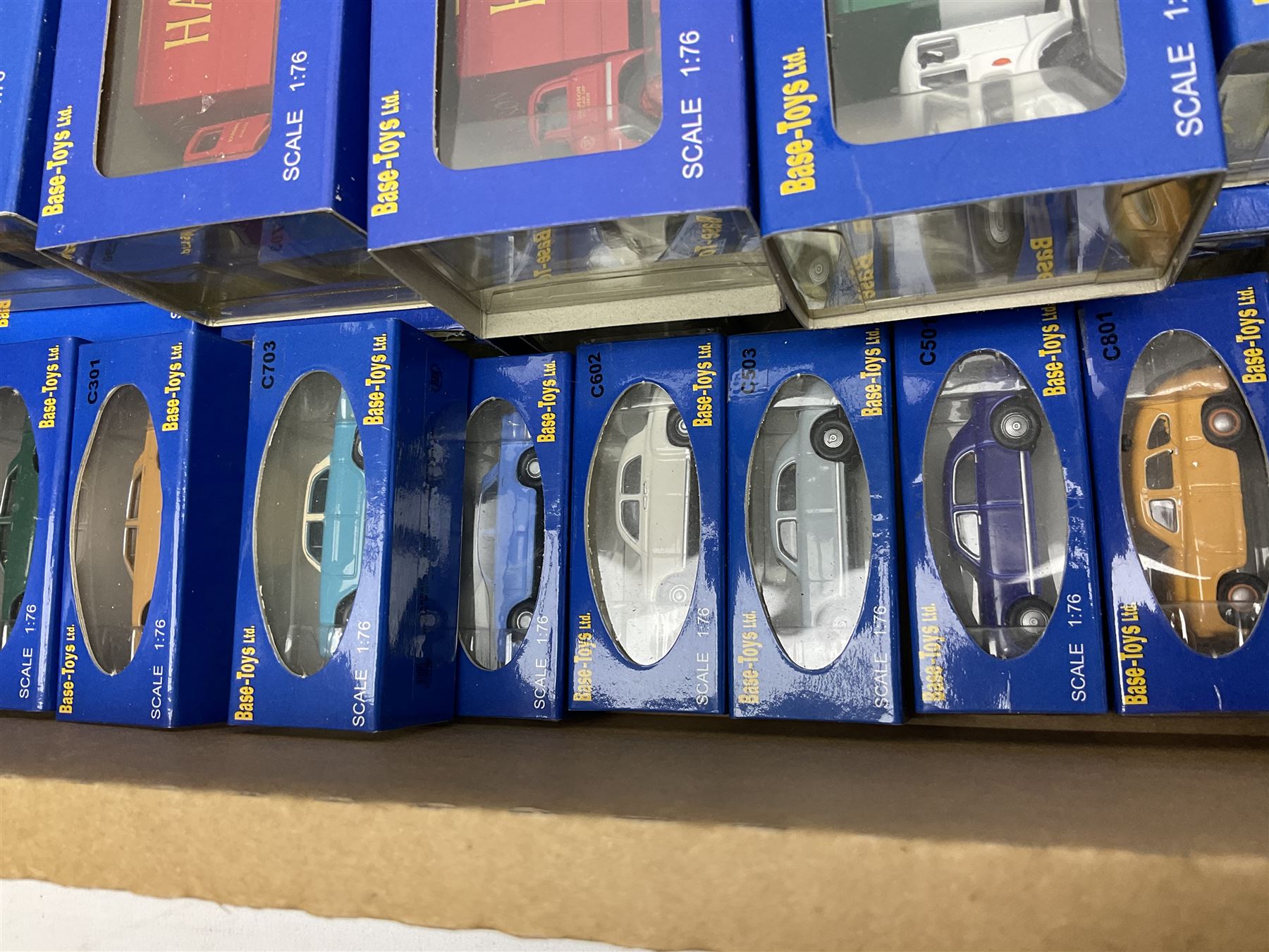 Fifty-seven Base Toys 1:76 scale die-cast models, all boxed (57)