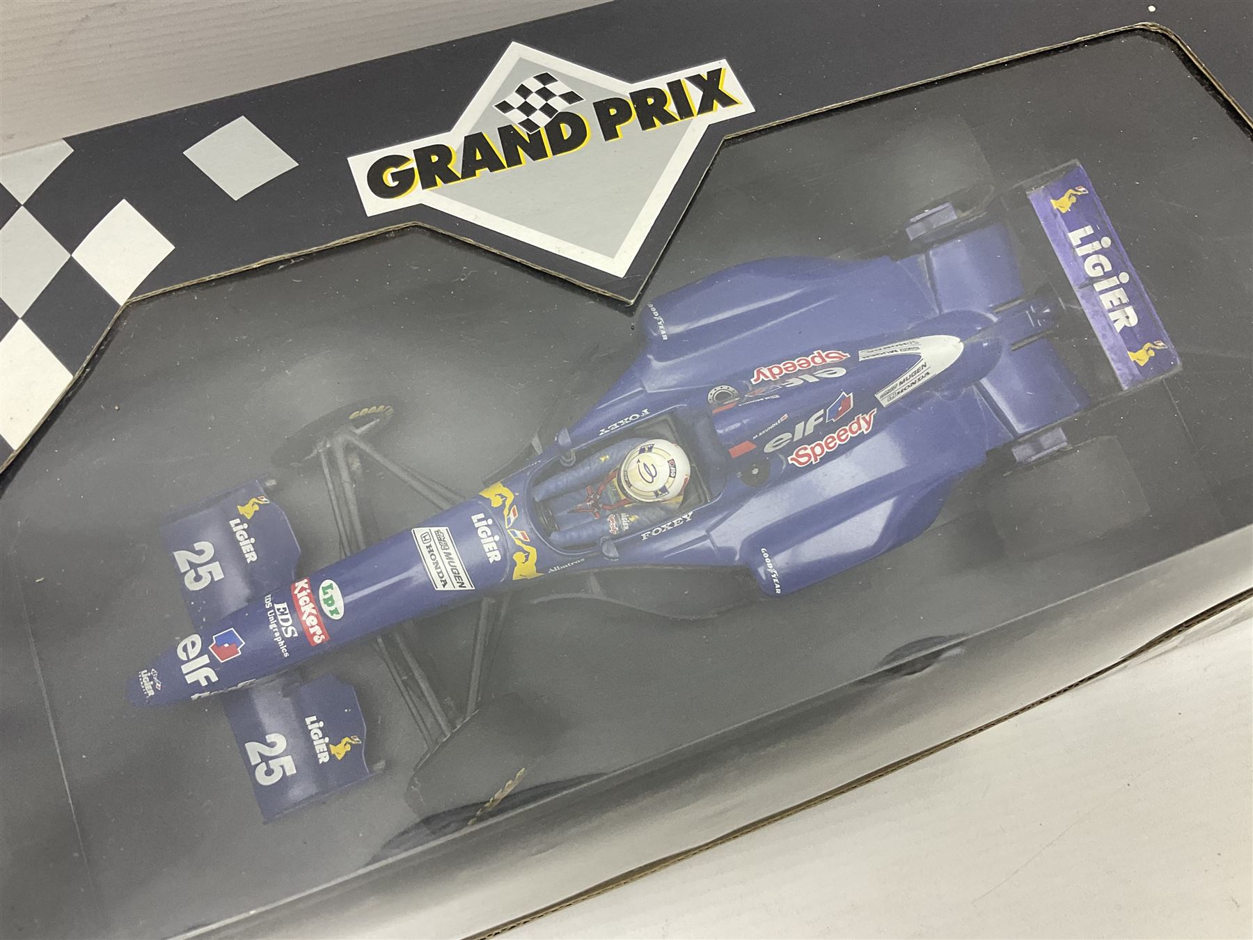 Three Paul's Model Art Grand Prix 1:18 scale die-cast racing cars - Williams Renault FW17 D. Hill; Ferrari 412 T1 J. Alesi; and Ligier Honda JS41 M. Brundle; all boxed (3)