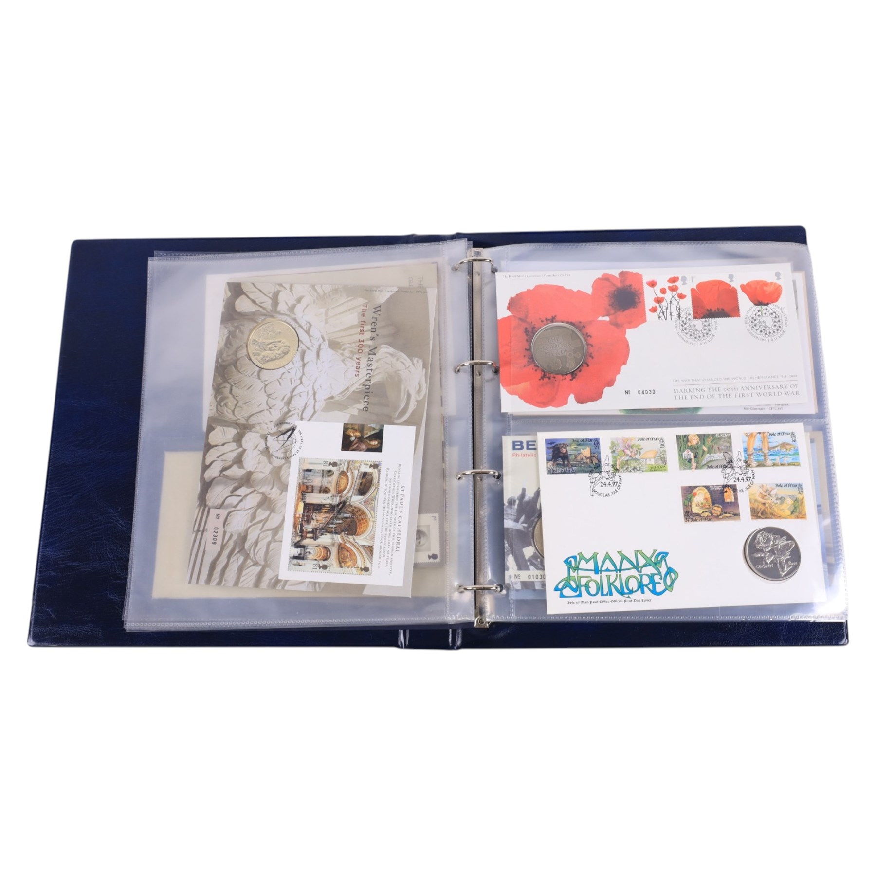 Coin and medallic covers, including 1984 first day issue Scottish one pound coin, 1999 Rugby World Cup with two pound coin, other one pound and two pound coin covers, various Royalty commemorative coin covers etc and various commemorative stamp, housed in five folders