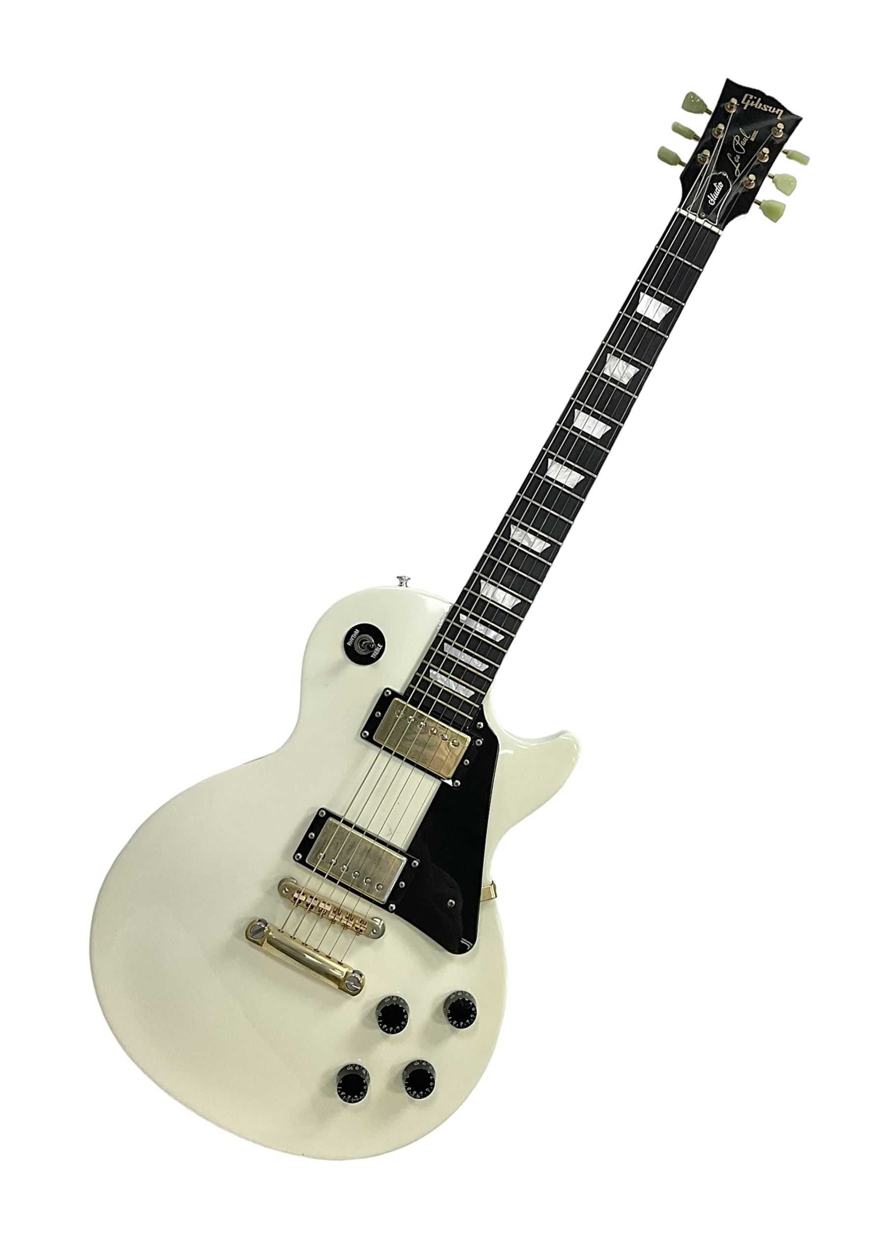2010 Gibson Les Paul studio guitar, serial no101500537 in white finish with gold and pale green hardware, in Auden soft carry case, guitar L100cm