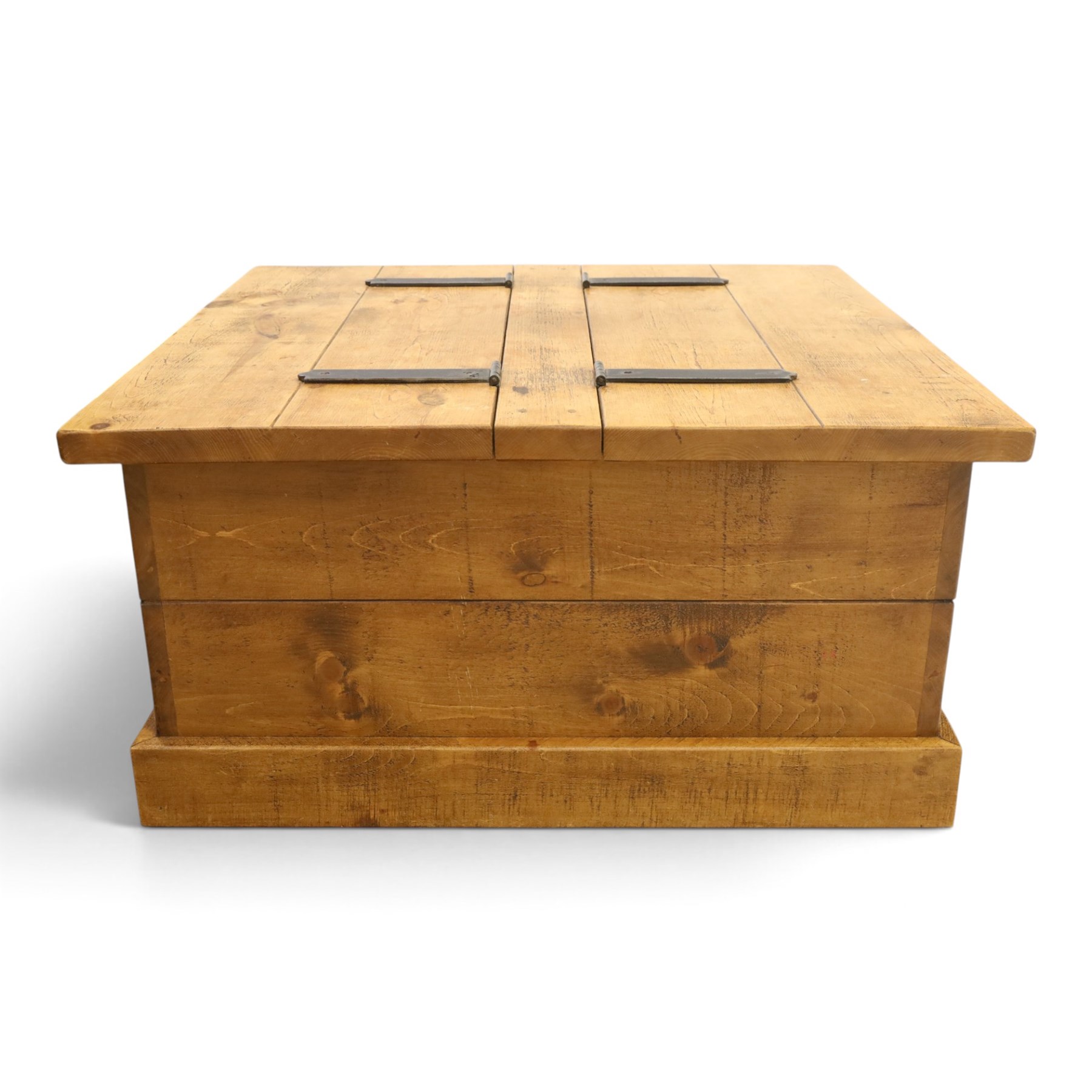 Indigo Furniture - rustic oak coffee table with double-hinged top concealing compartment, on skirted base