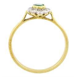 18ct gold emerald and diamond cluster ring, single oval cut emerald of approx 0.25 carat, surrounded by ten round brilliant cut diamonds, Birmingham 1995, total diamond weight approx 0.10 carat