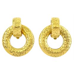 Chanel pair of gilt two in one clip-on earrings, with engraved 'Chanel' removable hoops, c...